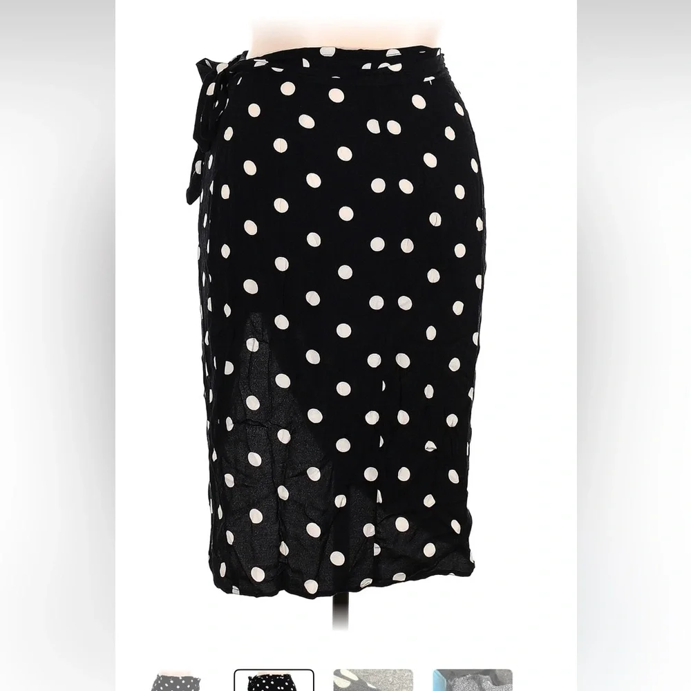 Reformation skirt. 53% Viscose, 47% Rayon - Picture 2 of 4